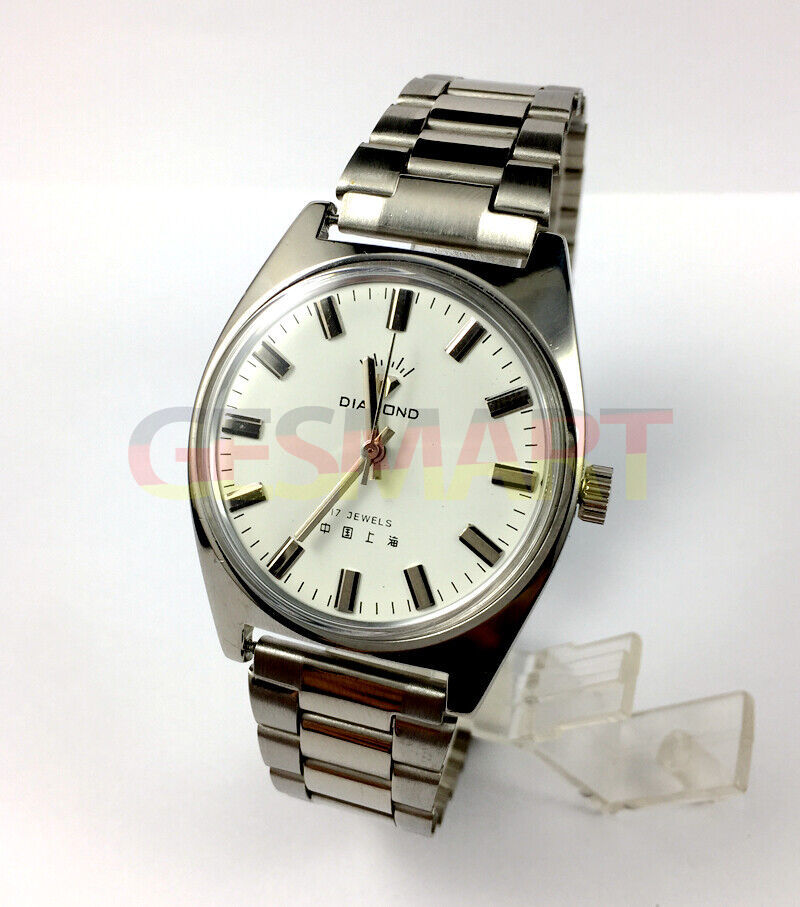 38mm Shanghai Diamond manual watch with white dial, silver case, 17 jewels, elegant timepiece.