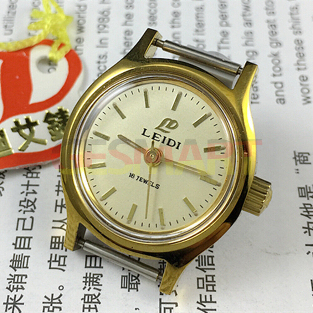 Leidi 27mm steel manual watch with golden dial and 18 jewels, paired with matching band for elegant style.