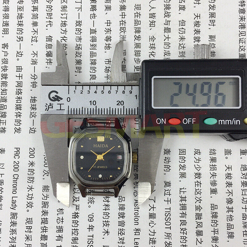 Elegant manual mechanical lady watch with octagonal case and sparkling imitation diamonds.