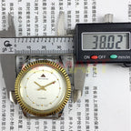 TAIHANG 38mm manual mechanical watch with silver dial, round case, and 17-jewel precision movement.