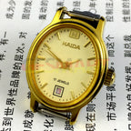 23mm lady watch, golden nail oval case, 17-jewel manual movement, calendar at 6 o?clock.
