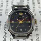 Manual mechanical lady watch with octagonal case, imitation diamonds, 17 jewels, elegant design.