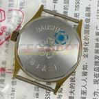 33mm Shanghai manual watch with white dial, golden nail markers, single calendar, elegant design.