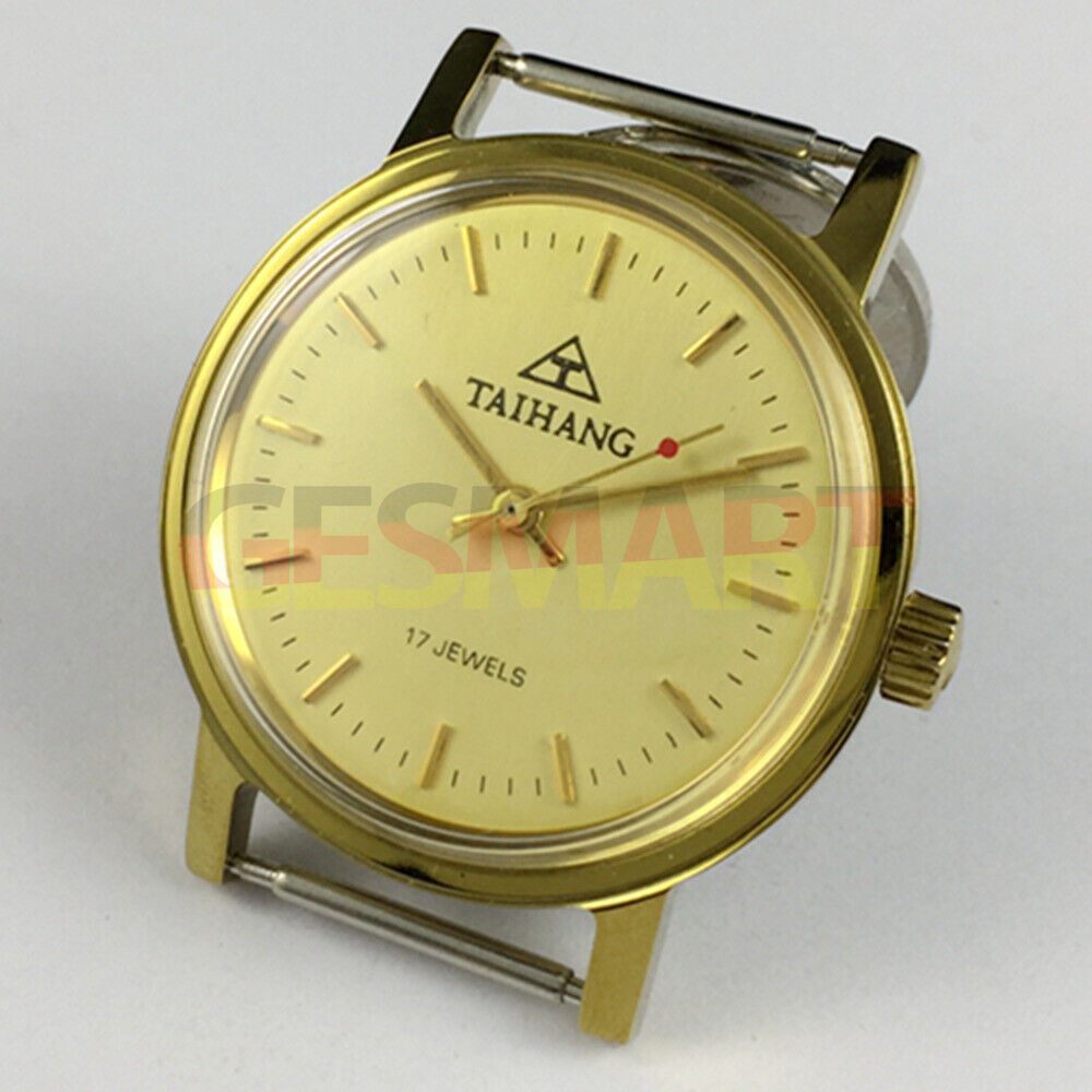 TAIHANG 37mm manual watch with gold round case, yellow dial, and gold nail hour markers for elegant style.