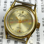Liaocheng TAISHAN manual mechanical lady watch with 19 jewels, golden nail markers, and elegant golden case.