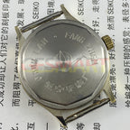 32mm manual mechanical watch with 17 jewels, yellow dial, and green lume hands for precise timekeeping.