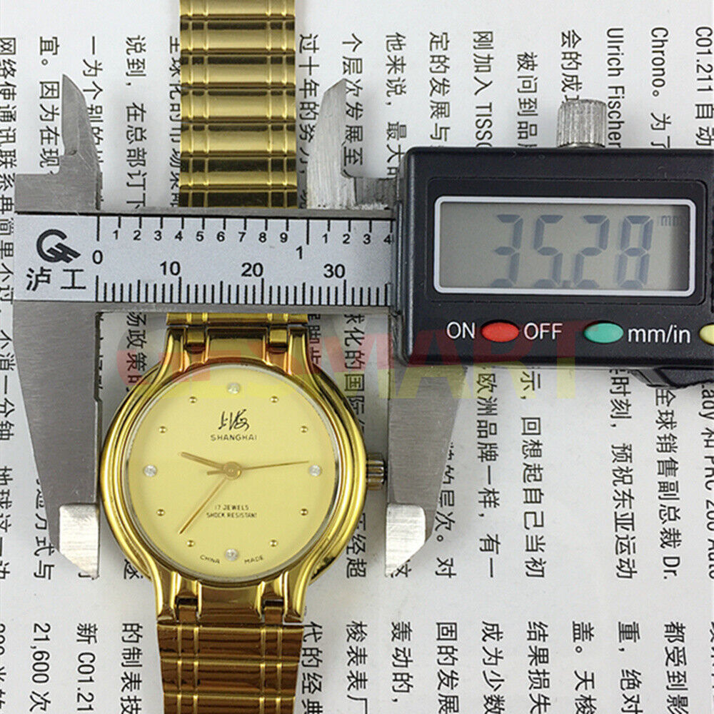 34mm Shanghai Factory manual mechanical watch with golden case and yellow dial, classic accessory for watch enthusiasts