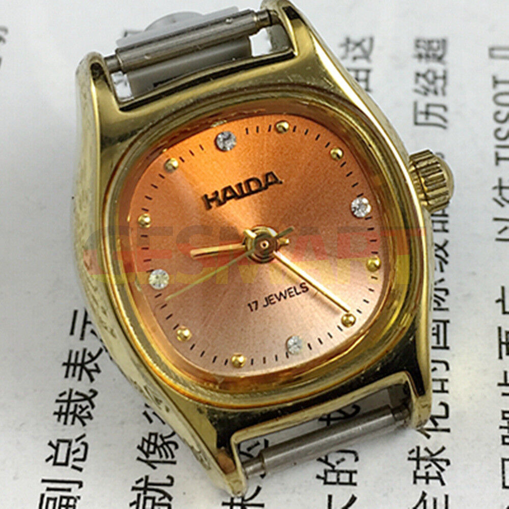 Elegant 24mm HAIDA Lady Watch with gradient orange dial, golden nail markers, and 17-jewel manual mechanical movement.