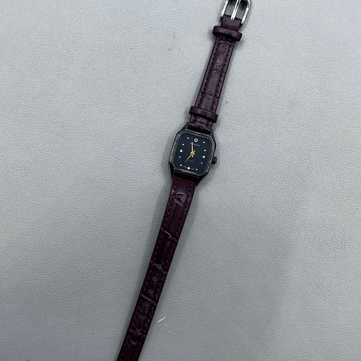33mm Dandong golden dial manual watch with square case, 17 jewels, elegant mechanical timepiece by Dandong.