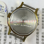 Leidi 27mm steel manual watch with 18 jewels and golden dial, paired with matching band for elegant wear.
