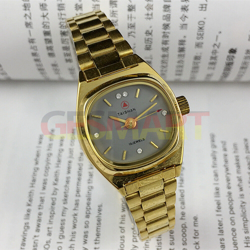 TAISHAN elegant lady watch with 19 jewels, imitation diamond markers, and golden case for sophisticated style.