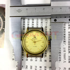 34mm manual mechanical watch with 17 jewels, golden dial, and round gold case, classic style.